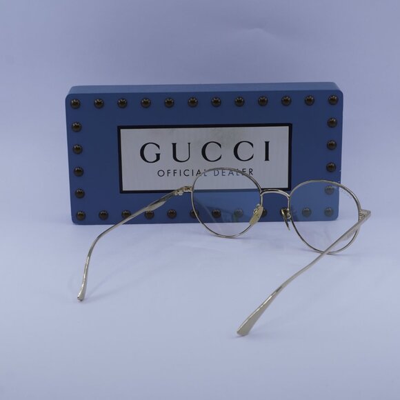 Gucci GG0337S 001 Round Sunglasses - Gold\Clear to Brown Photochromic - Picture 9 of 10